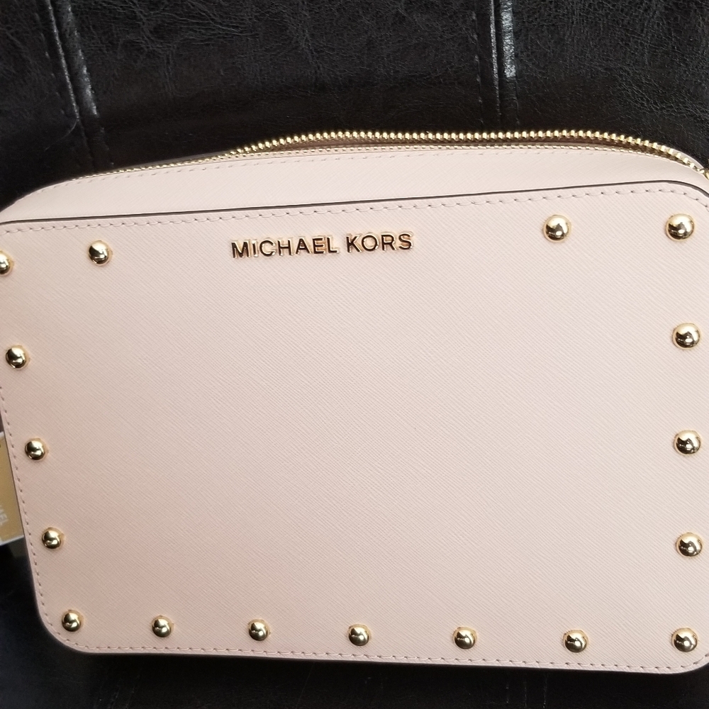 Mk cross body